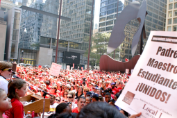 Chicago Teachers Union members rally at a Labor Day gathering. 