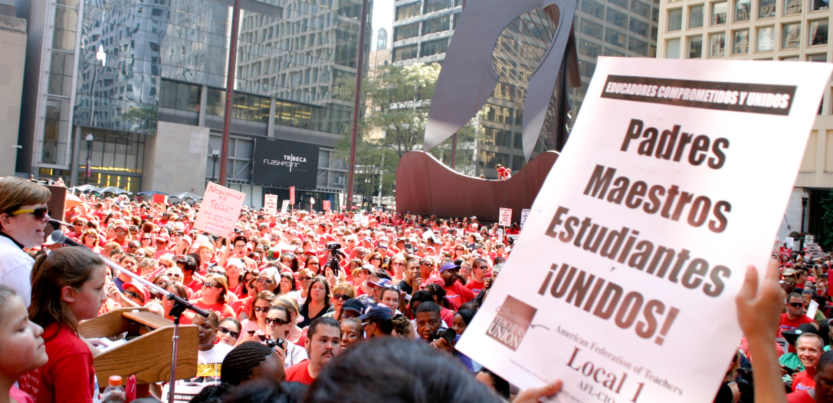 Chicago Teachers Union members rally at a Labor Day gathering. 