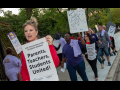 Chicago teachers and Service Employees (SEIU) Local 73 marching with signs.