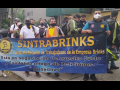 Sintrabrinks workers picketing behind a blue banner in Cali, Colombia in December 2020.