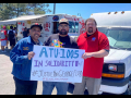 Three men (two Black, one white) hold a sign: "ATU-1005 in solidarity w/ #JusticeForGeorgeFloyd #BlackLivesMatter." Taco truck in background.