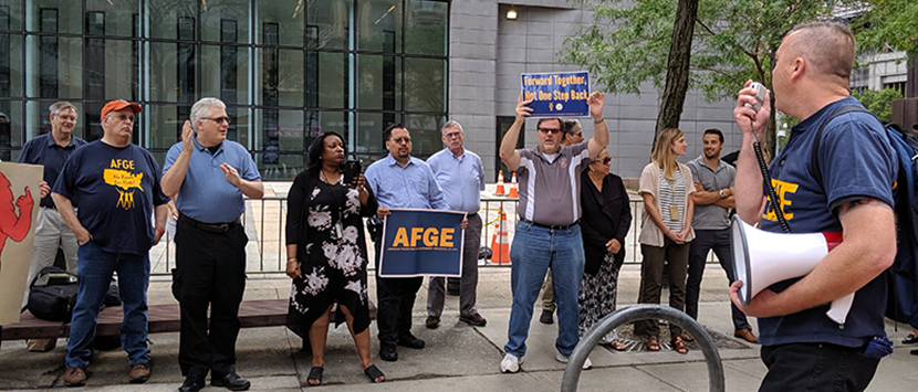 EPA workers protest the government's anti-union directive at a union rally in Manhattan in August.