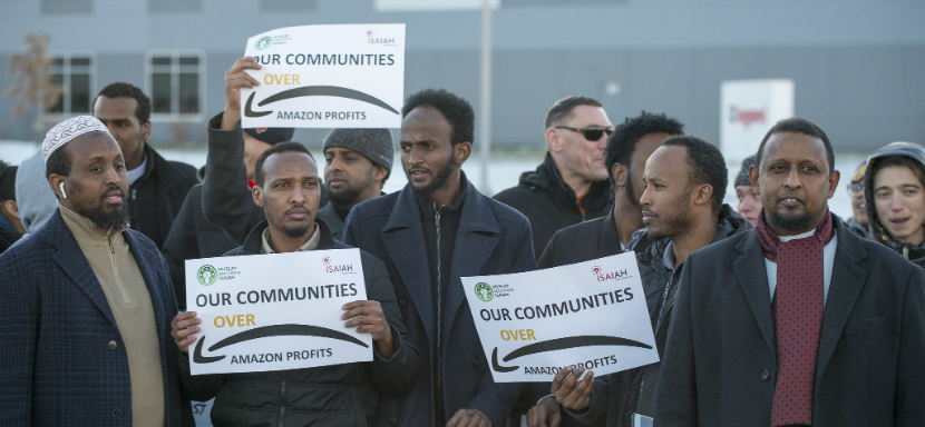 Around 200 Amazon workers, mostly of East African descent, protested outside their workplace in Minnesota.