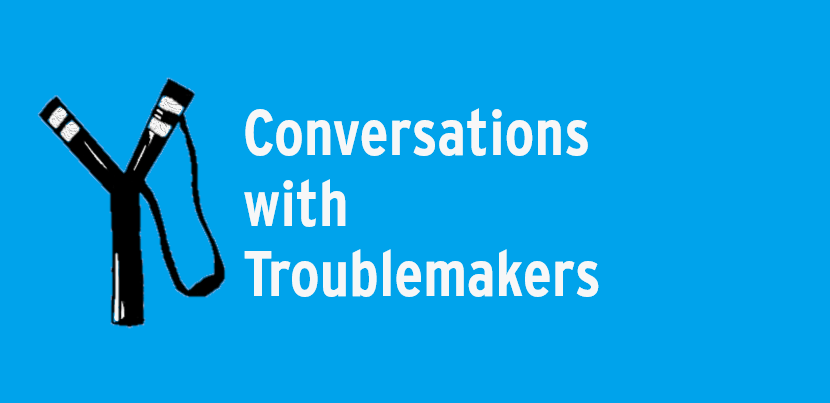 Black slingshot on blue background with text "Conversations with Troublemakers"