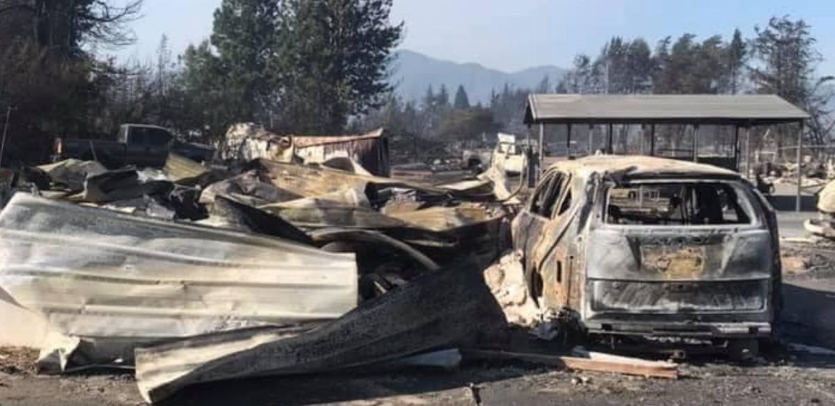 building and vehicle totally destroyed by fire