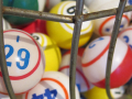 Bingo balls in metal cage