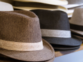 Stacks of hats on display at a store.