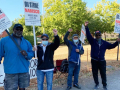 Several Nabisco picketers with signs outside in Portland, Oregon.