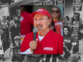 Inset photo of Sal Rosselli, a white man in red NUHW scrubs, speaking on a mic at a rally. Behind this, a black-and-white photo of a racially diverse, mostly female group of NUHW workers pose on strike. Most carry printed picket signs with messages like "Patients before profits" and "Kaiser, don't deny my patients [the rest is obscured]." One woman carries a large handpainted sign with a fist logo and the words "Huelga de NUHW," Spanish for NUHW strike.