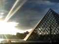 The Louvre's outside pyramid at sunset.