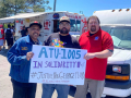 Three men (two Black, one white) hold a sign: "ATU-1005 in solidarity w/ #JusticeForGeorgeFloyd #BlackLivesMatter." Taco truck in background.